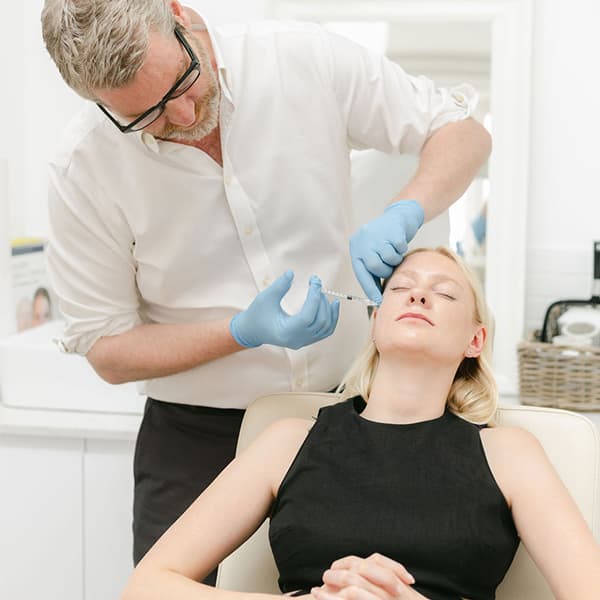 DrBrennand-injecting-face